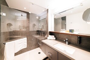 Shower, eco-friendly toiletries, hair dryer, slippers