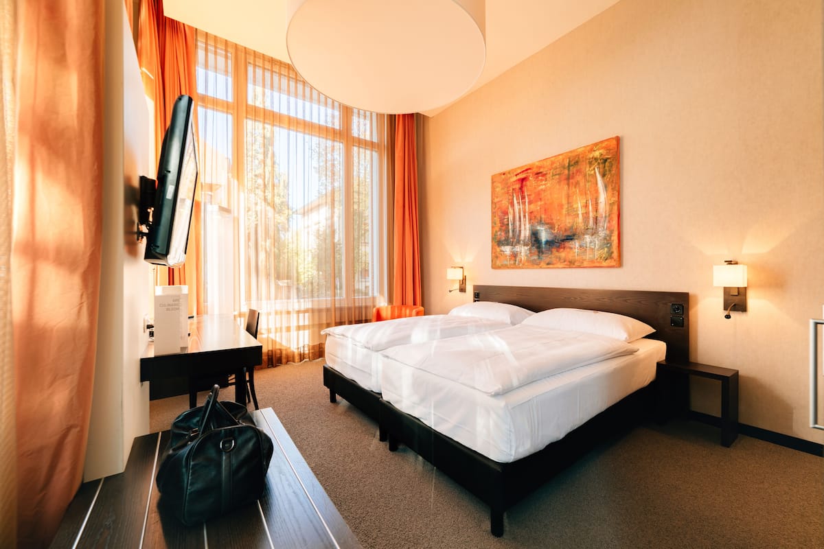 Chambre Supérieure | Literie hypoallergénique, articles gratuits dans le mini-bar