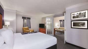 Suite, 1 King Bed, Non Smoking | Pillow-top beds, desk, iron/ironing board, free cots/infant beds