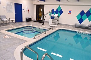Indoor pool, open 7:00 AM to 10:00 PM, sun loungers
