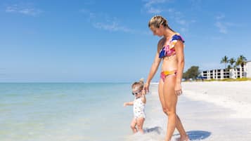 Walking along the shoreline, guests can enjoy the calm waters and scenic views.