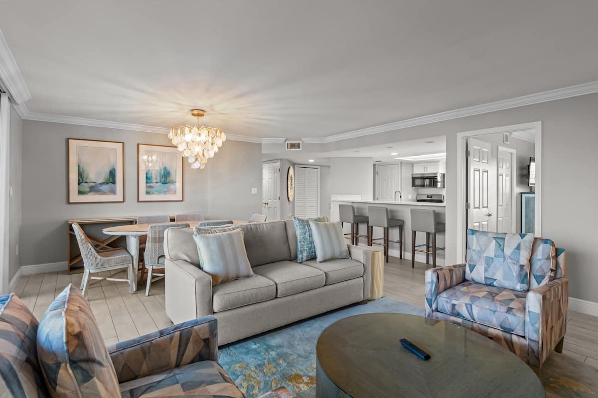 Standard Condo | Living area | 50-inch TV with cable channels, DVD player