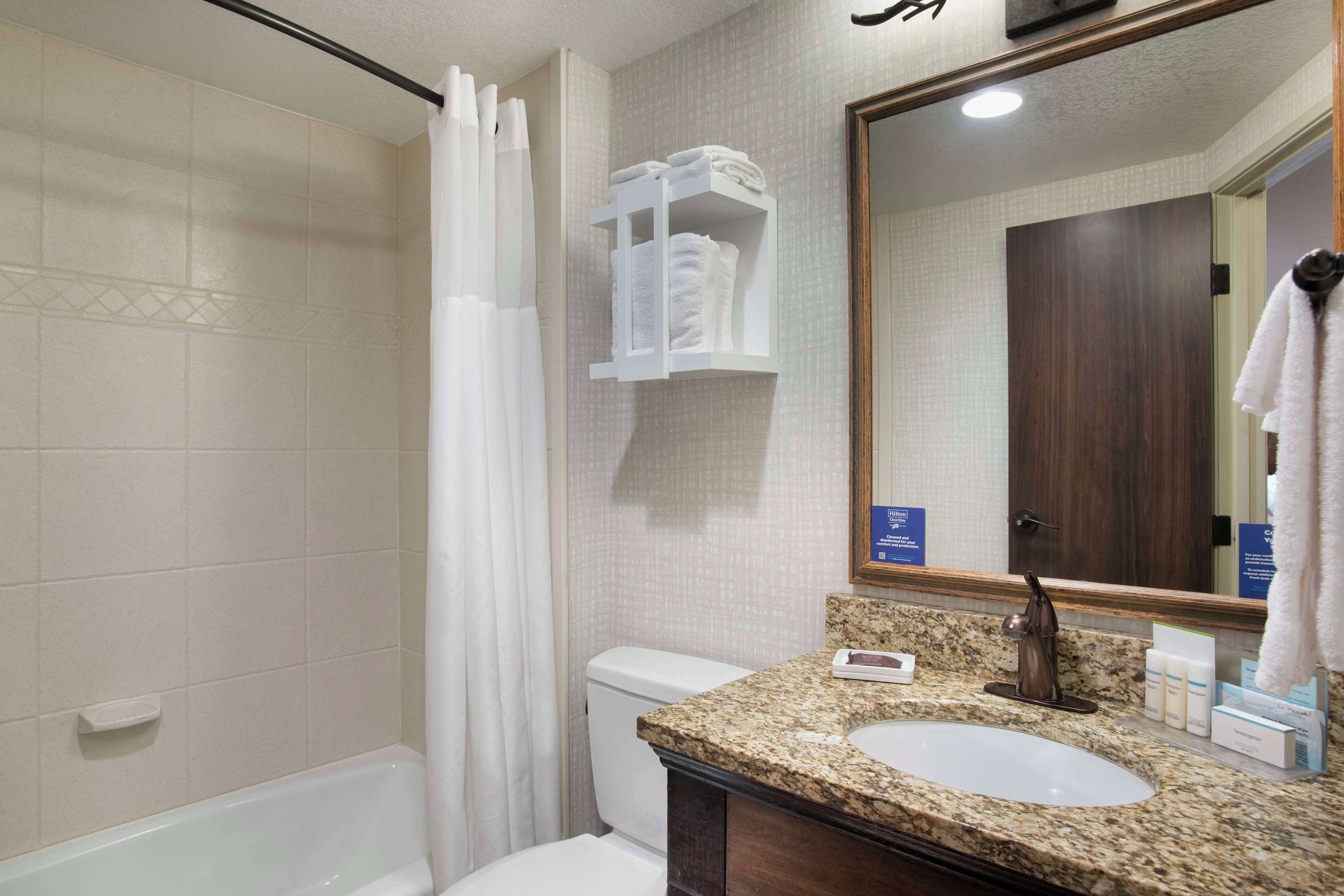 room, multiple beds, refrigerator & microwave | bathroom | combined shower/bathtub, free toiletries, hair dryer, towels
