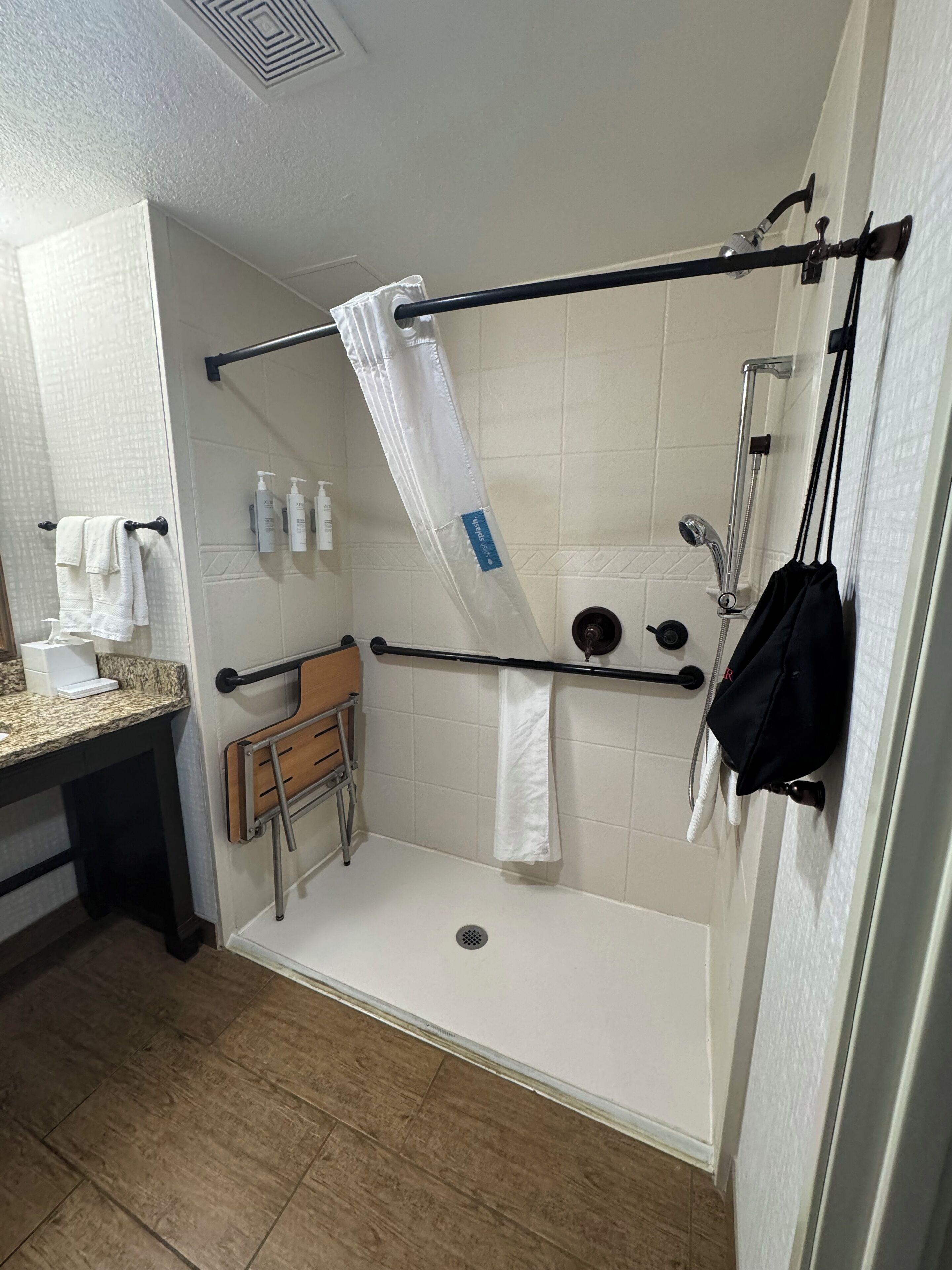 combined shower/bathtub, free toiletries, hair dryer, towels