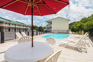 Outdoor pool, open 10 AM to 10 PM, sun loungers