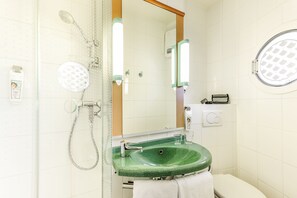 Shower, eco-friendly toiletries, hair dryer, towels