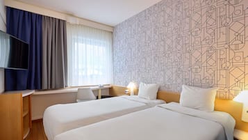 Standardzimmer, 2 Einzelbetten | Zimmersafe, Schreibtisch, Verdunkelungsvorhänge, kostenloses WLAN
