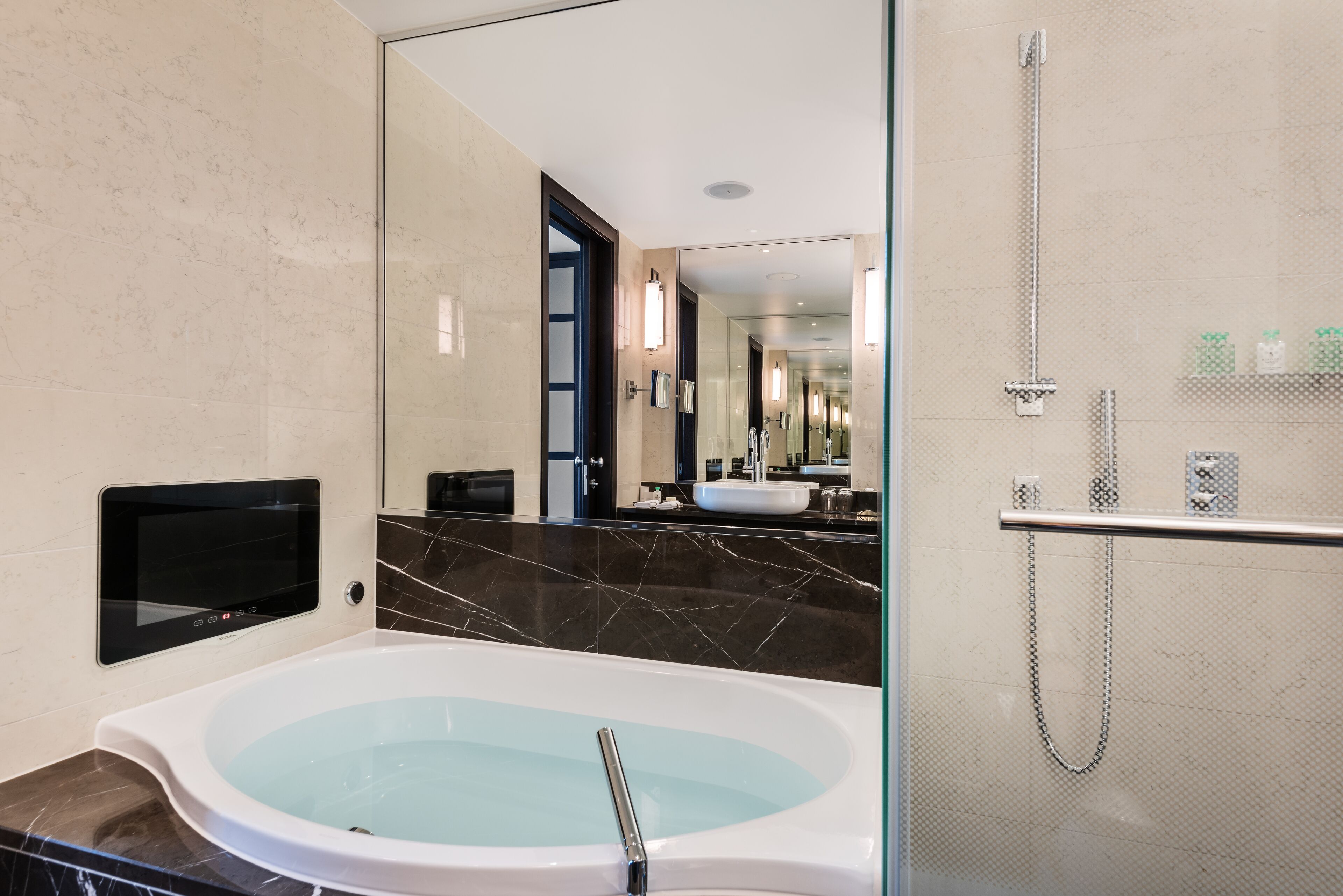 rainfall showerhead, free toiletries, hair dryer, slippers