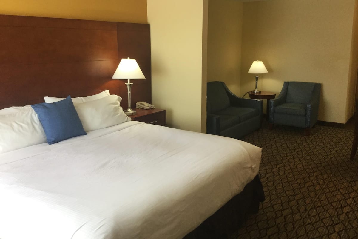 Premium bedding, pillow-top beds, desk, laptop workspace