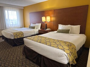 Premium bedding, pillowtop beds, desk, laptop workspace