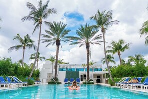 Outdoor pool, open 7:00 AM to 8:00 PM, pool umbrellas, pool loungers