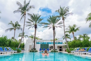 Outdoor pool, open 7:00 AM to 8:00 PM, pool umbrellas, sun loungers