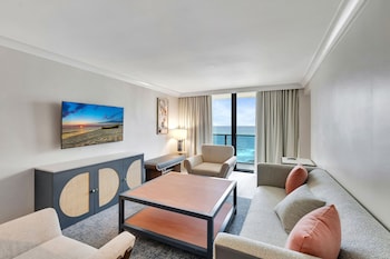 King Suite Balcony Oceanfront | Frette Italian sheets, premium bedding, down comforters, pillowtop beds at Tideline Palm Beach Ocean Resort and Spa
