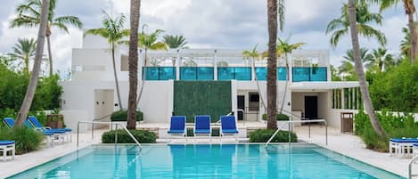 Outdoor pool, open 7:00 AM to 8:00 PM, pool umbrellas, pool loungers