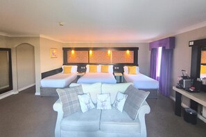 Deluxe Family Suite -Double Bed & 3 Single Beds | 1 bedroom, in-room safe, desk, iron/ironing board