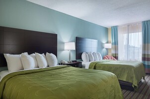 Desk, laptop workspace, blackout drapes, iron/ironing board