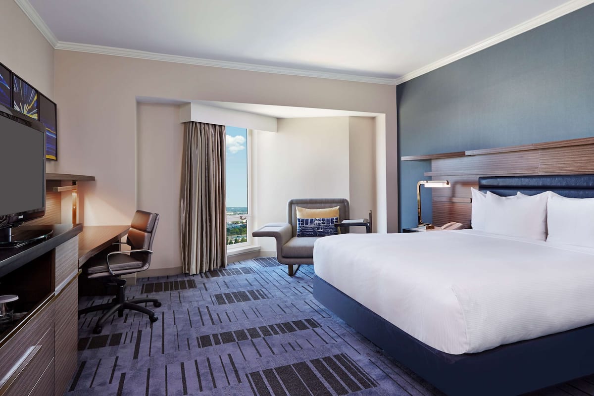 executive suite, 1 king bed | premium bedding, in-room safe, desk, iron/ironing board