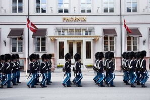 A hotel named 'PHOENIX' with a formal entrance and uniformed guards. - Phoenix Copenhagen (Copenhagen)