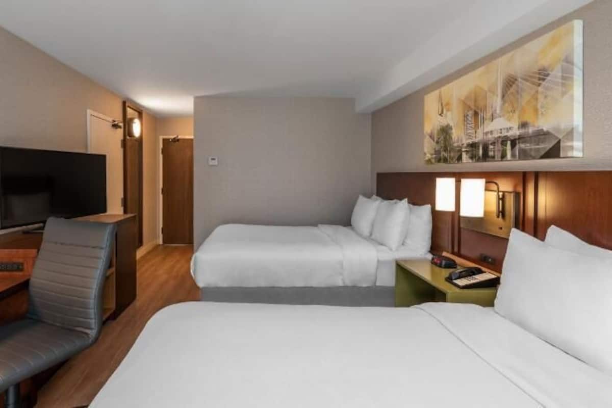 Premium bedding, pillowtop beds, desk, blackout drapes