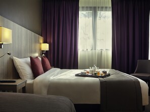 Classic Room, Multiple Beds | Minibar, in-room safe, desk, blackout drapes