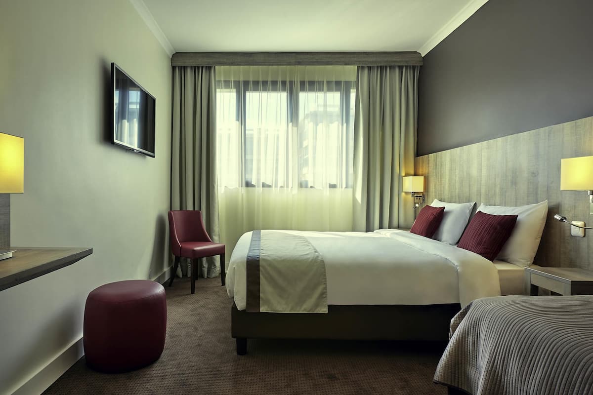 Classic Room, Multiple Beds | Minibar, in-room safe, desk, blackout curtains