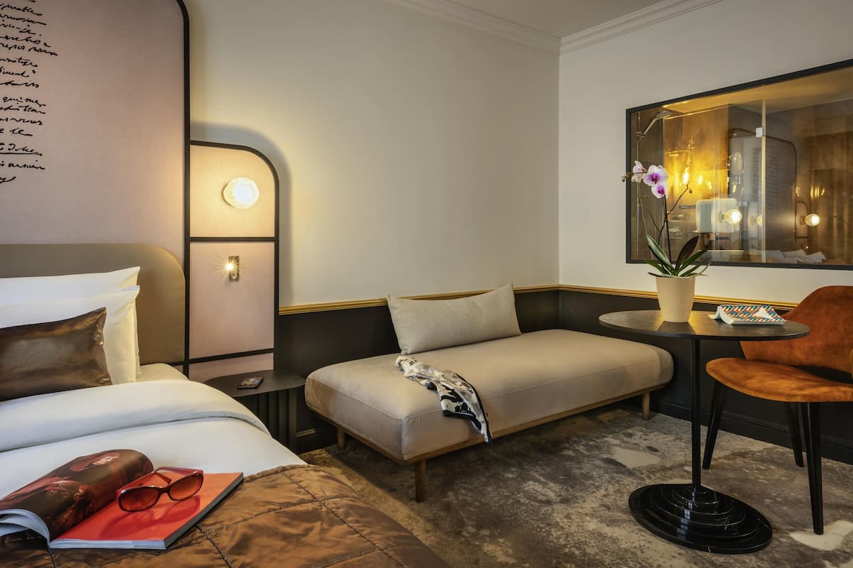 Privilege, Room, Multiple Beds | Minibar, in-room safe, desk, blackout drapes