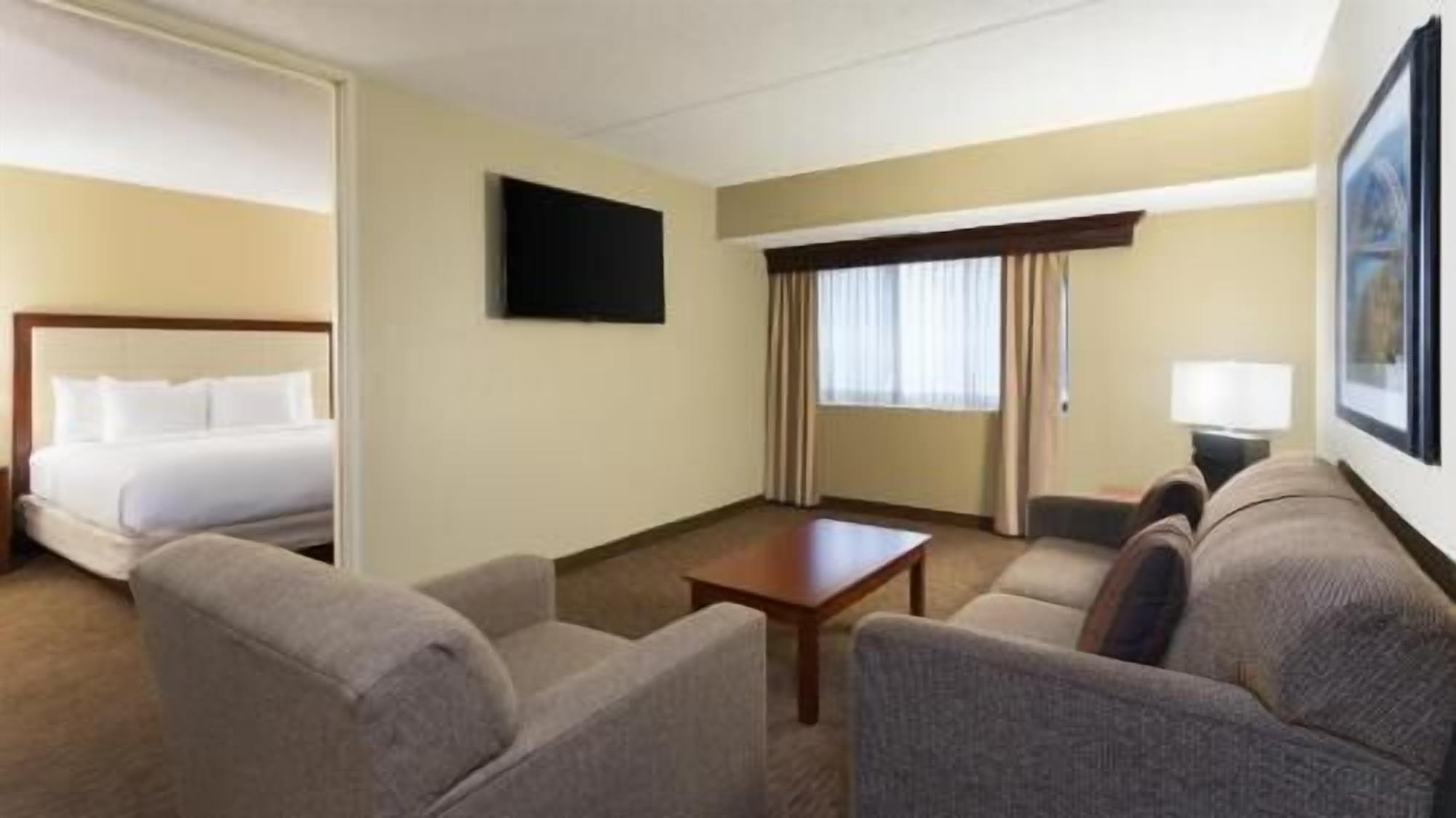 Premium bedding, down duvets, pillow-top beds, in-room safe