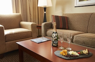 Suite, Non Smoking (2 Double Beds with Sofa bed) | Living room | TV