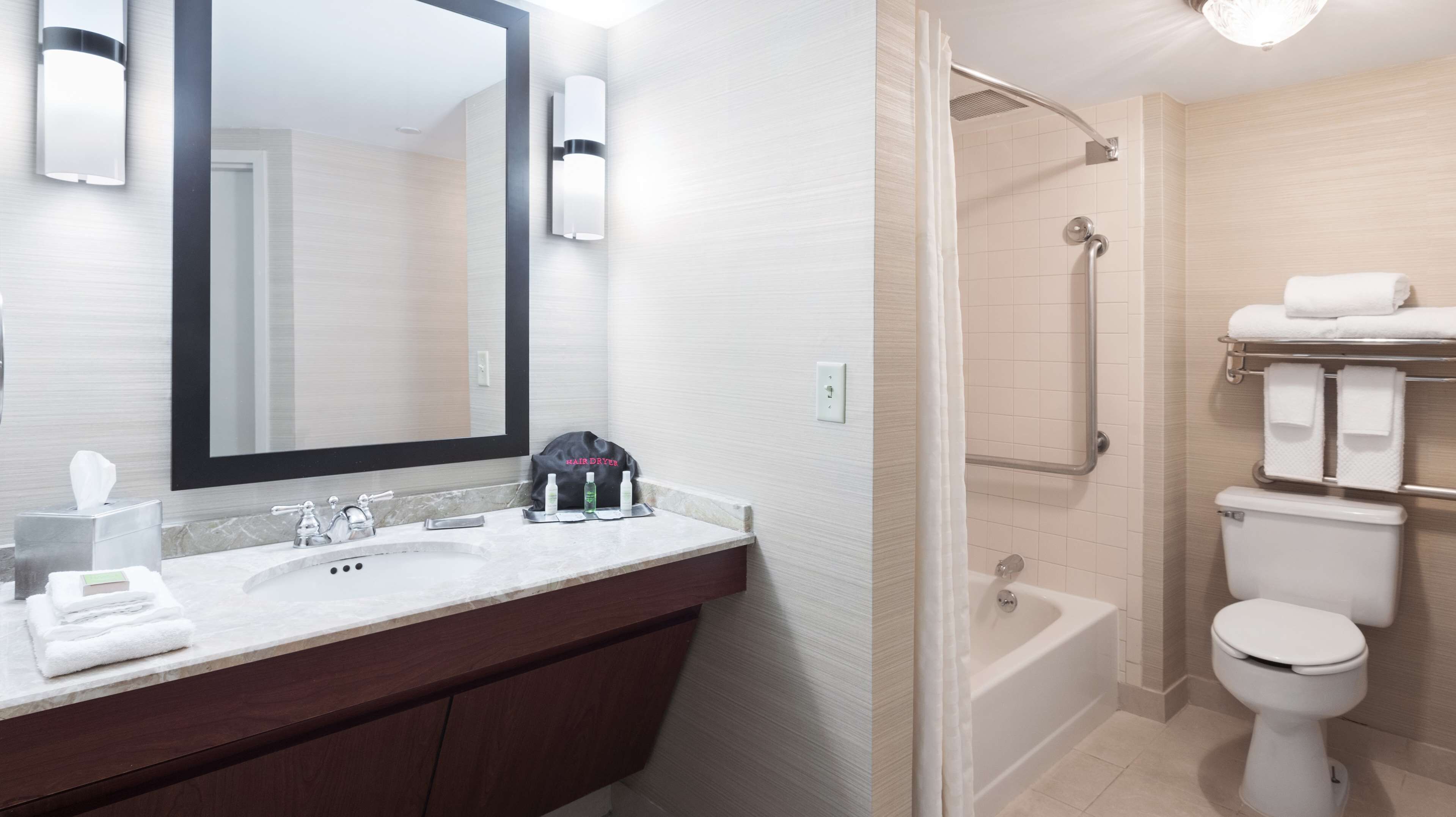 suite, 1 king bed, non smoking | bathroom | eco-friendly toiletries, hair dryer, towels, soap