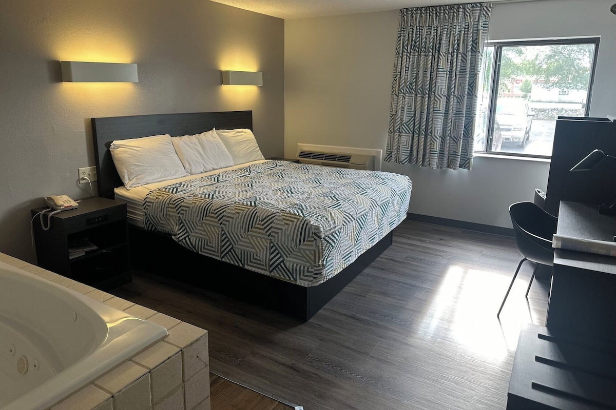 Desk, blackout drapes, iron/ironing board, free WiFi