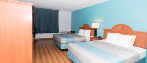 Desk, laptop workspace, blackout drapes, iron/ironing board