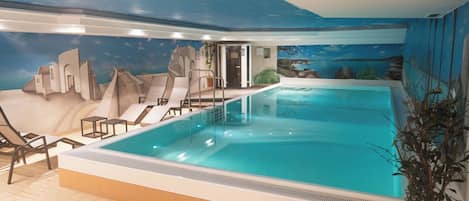 Indoor pool, open 6:30 AM to 10:30 PM, sun loungers