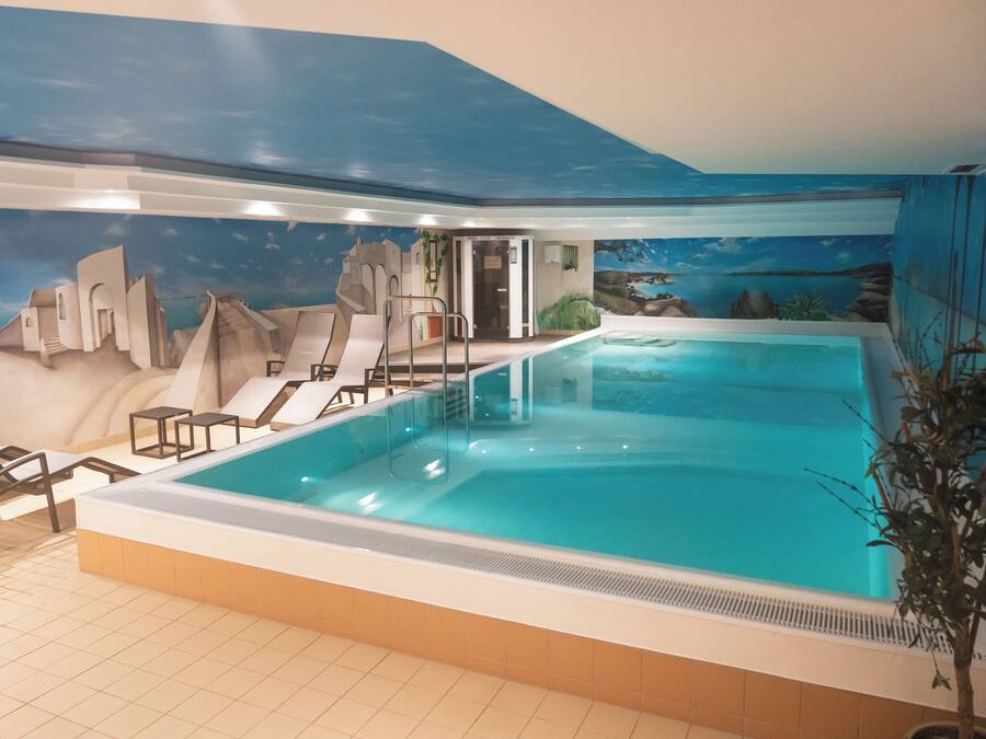 Indoor pool, open 6:30 AM to 10:30 PM, sun loungers