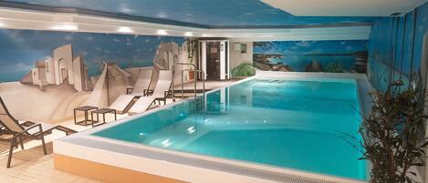 Indoor pool, open 6:30 AM to 10:30 PM, pool loungers