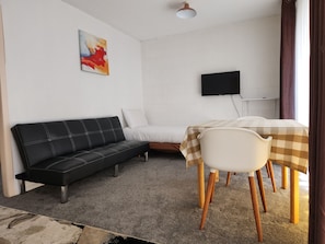 Standard Suite, 1 Bedroom, Non Smoking, Kitchen | Living area | 32-inch flat-screen TV with cable channels, TV