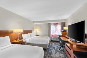 A hotel room with two beds, a desk, a TV, and a window with curtains. - Fairfield Inn by Marriott Boston Woburn-Burlington (Woburn)