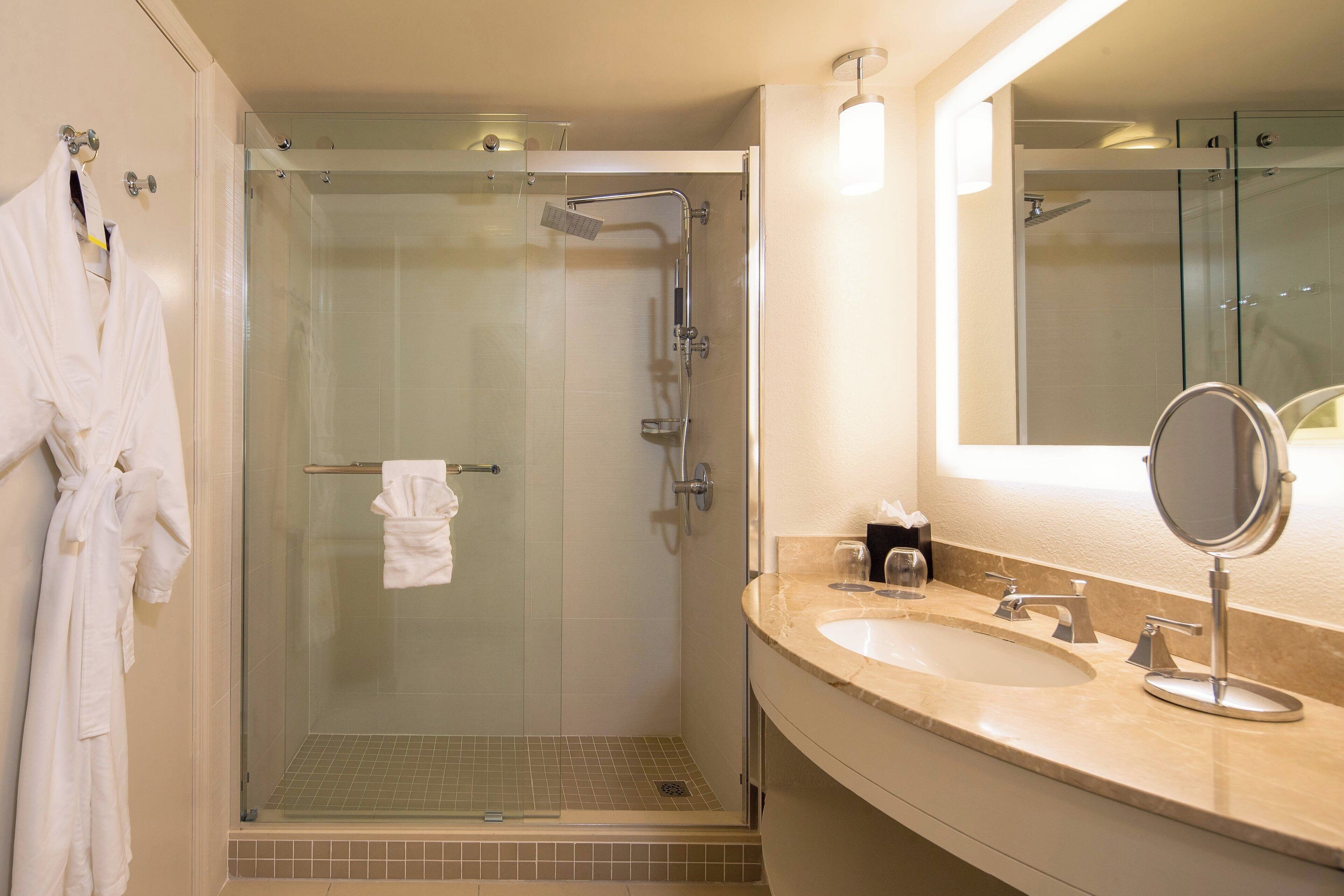 rainfall showerhead, designer toiletries, hair dryer, bathrobes