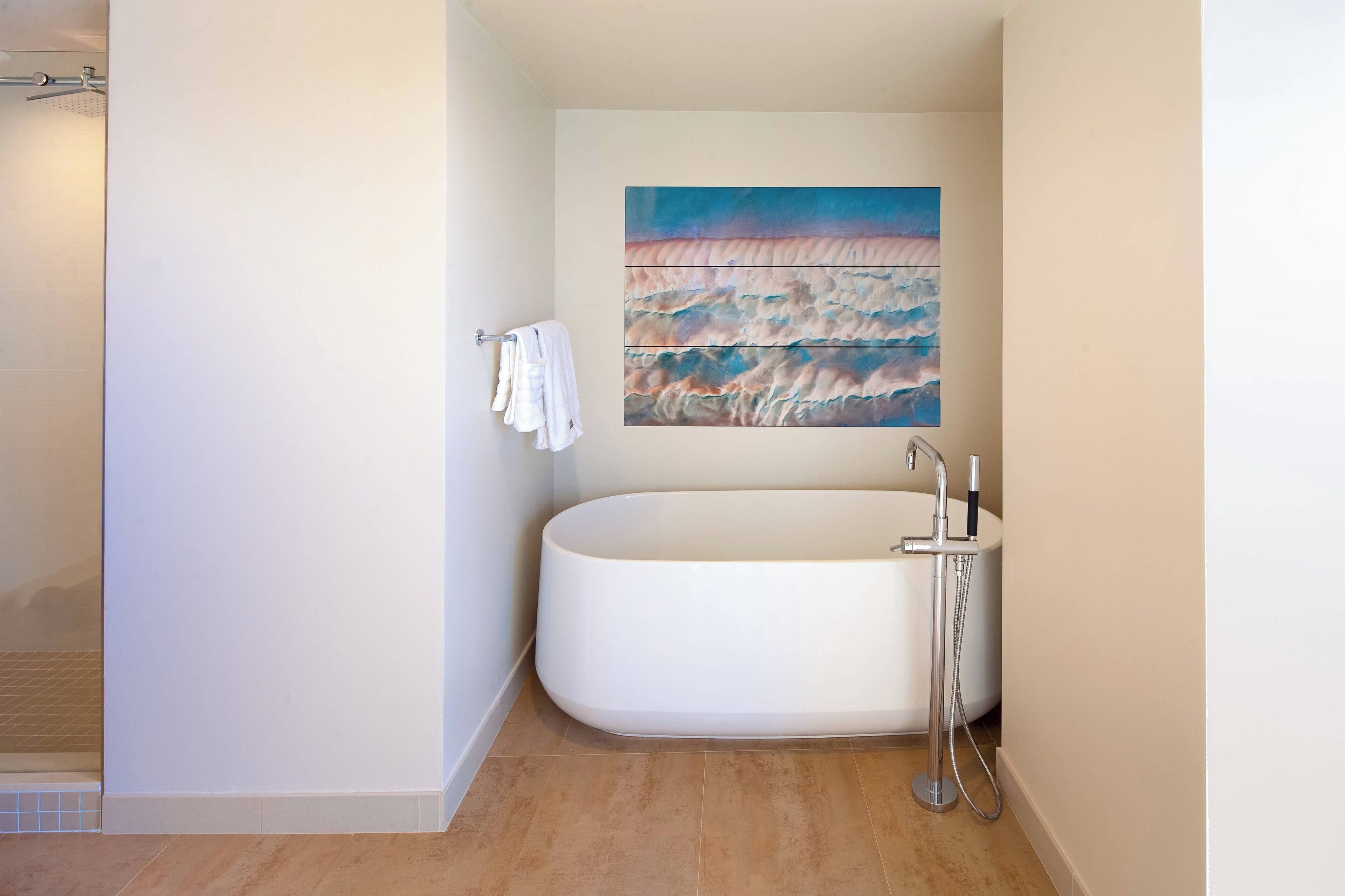 executive suite, 1 bedroom, bay view | bathroom | rainfall showerhead, designer toiletries, hair dryer, bathrobes