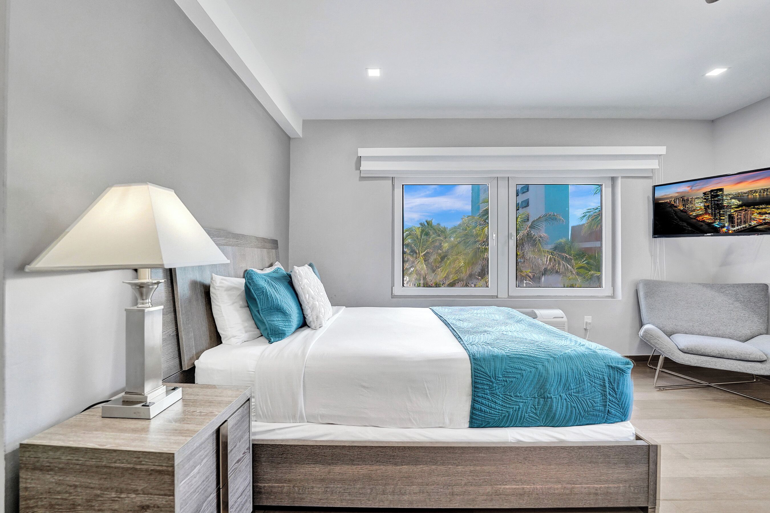 standard room, 2 double beds, partial sea view | television