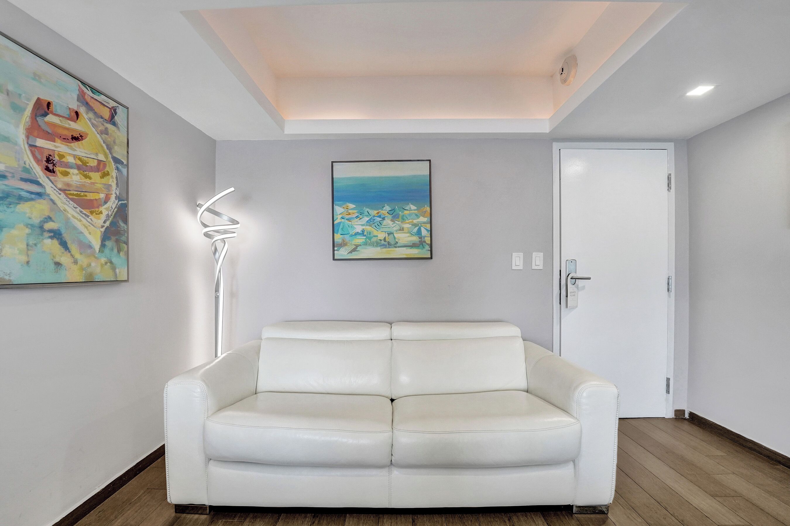 premium room, 1 king bed, oceanfront | living area | led tv