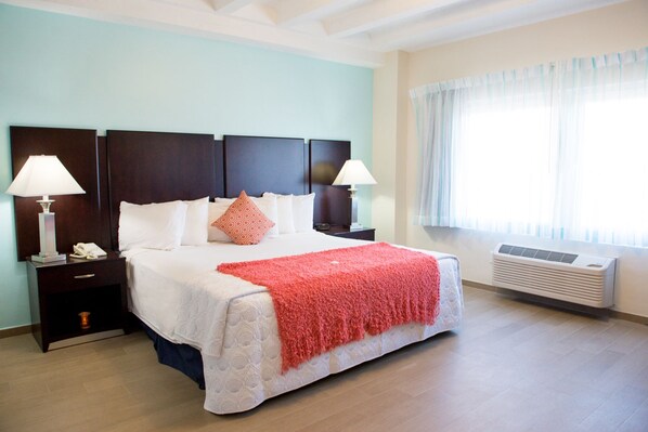 Standard Room, 1 King Bed, Partial Sea View | Premium bedding, in-room safe, desk, blackout drapes