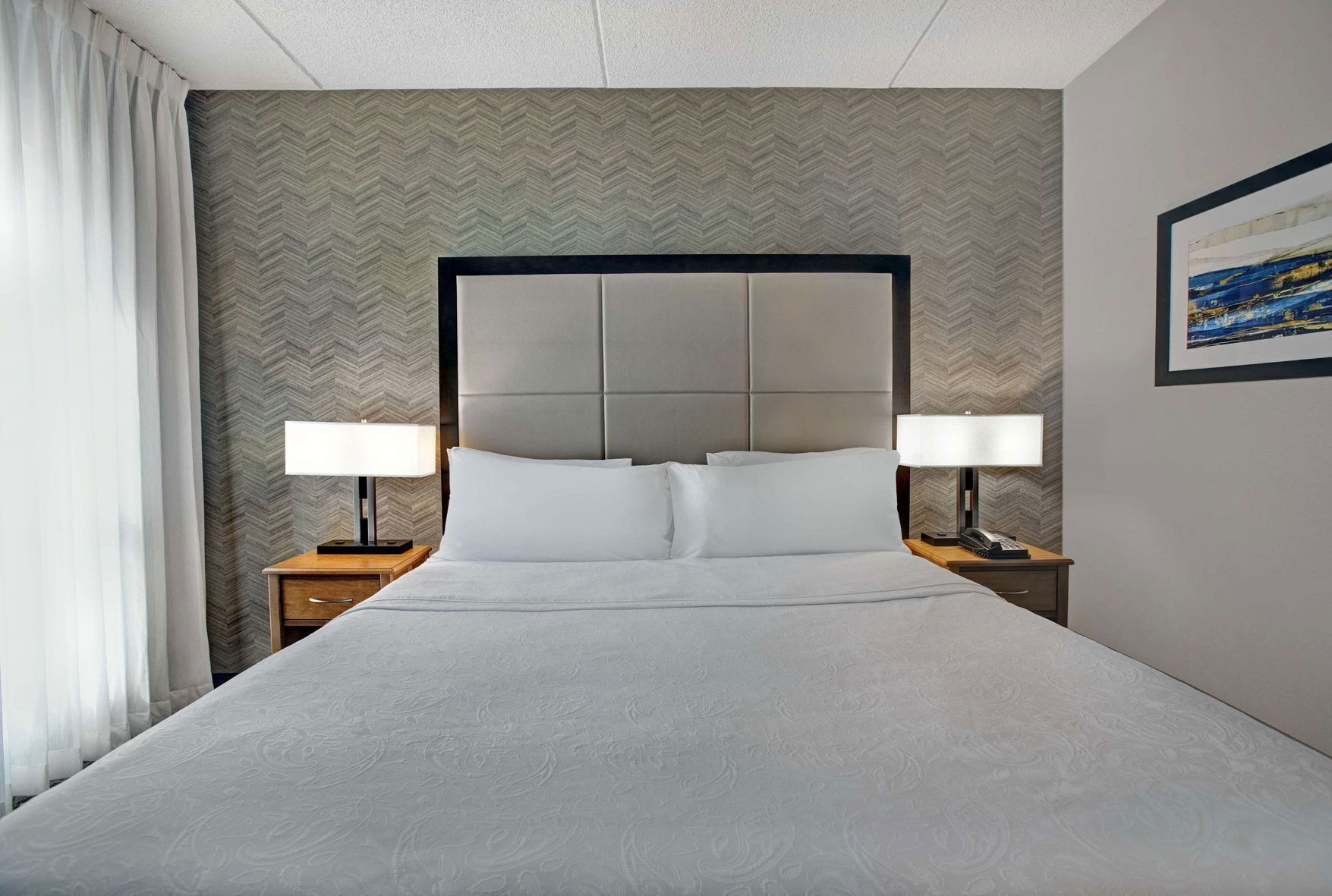 Premium bedding, desk, blackout drapes, iron/ironing board