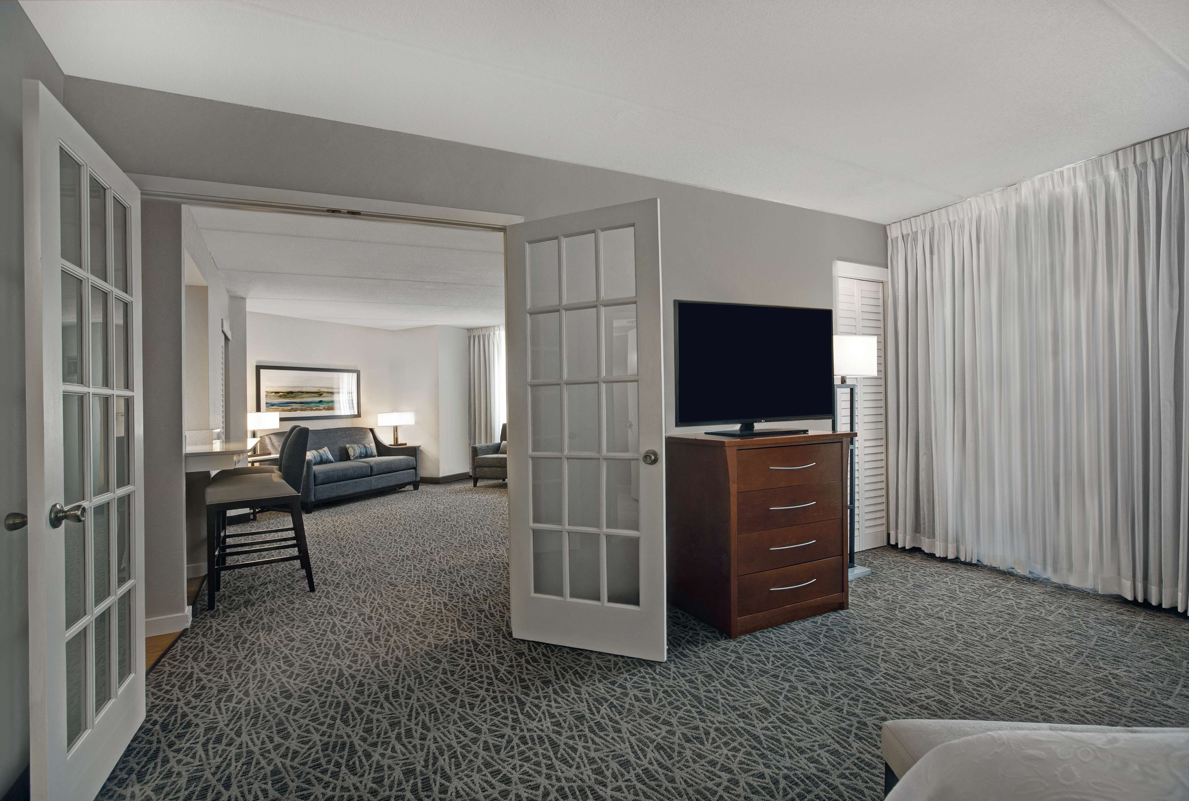 suite, 1 king bed, non smoking | premium bedding, desk, blackout curtains, iron/ironing board