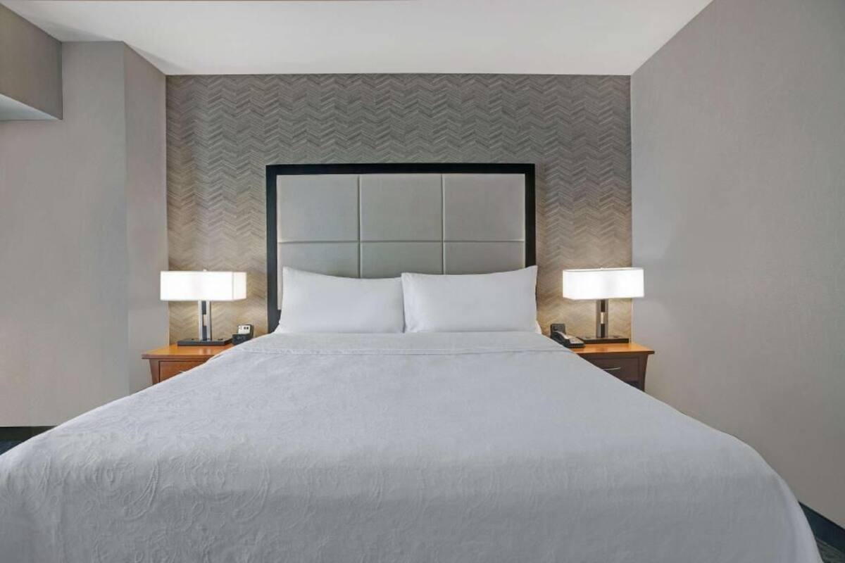 Premium bedding, desk, blackout drapes, iron/ironing board