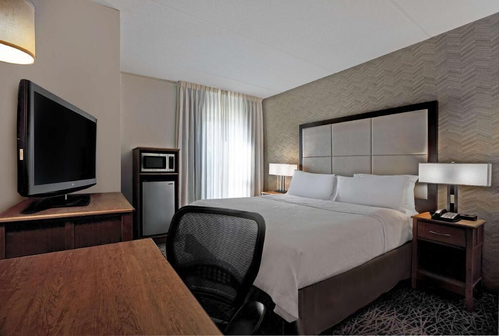 Premium bedding, desk, blackout drapes, iron/ironing board