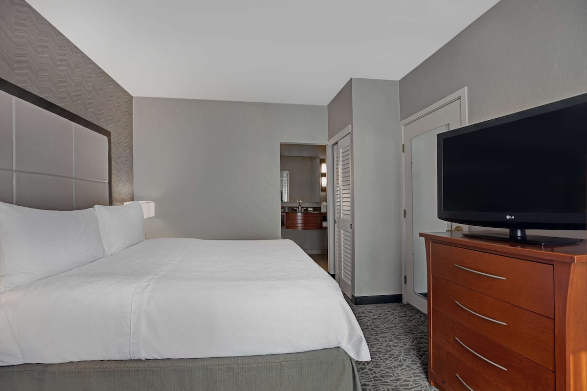 Premium bedding, desk, blackout drapes, iron/ironing board