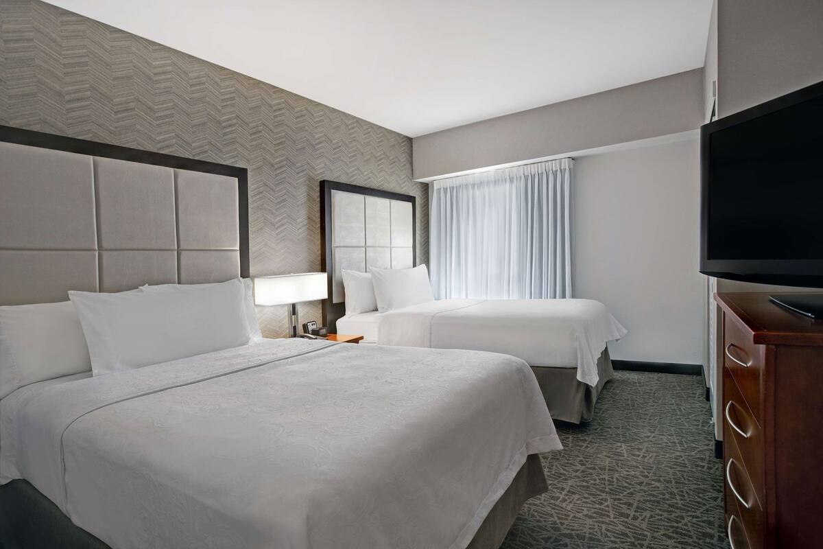 Premium bedding, desk, blackout drapes, iron/ironing board