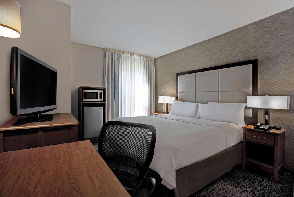 Premium bedding, desk, blackout drapes, iron/ironing board