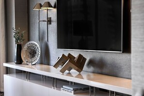 Premium bedding, down comforters, pillowtop beds, in-room safe