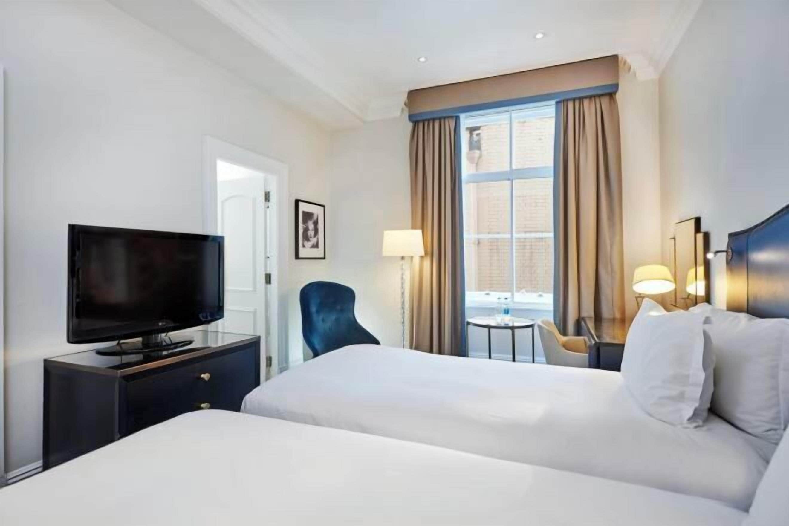 Literie de qualité supérieure, coffres-forts dans les chambres, bureau